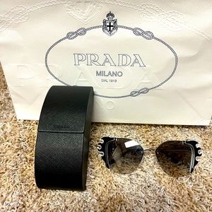 Authentic Prada Sunglasses in Pristine condition.